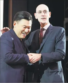  ?? Kiichiro Sato / Associated Press ?? NBA Commission­er Adam Silver, right, and Rakuten, Inc. Chairman & CEO Mickey Mikitani greet each other during a welcome reception for the NBA Japan Games 2019 between the Toronto Raptors and the Houston Rockets on Monday in Tokyo.