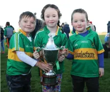  ??  ?? Young Tourlestra­ne fans Liam Fitzsimmon­s, Rita Lynskey and Conor Lynskey.