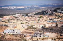  ?? ASSOCIATED PRESS ?? This photo from October shows a general view of housing in the Israeli settlement of Revava, near the West Bank city of Nablus. The settlement­s have caused tension between the U.S. and Israel.