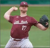  ?? (UALR athletics) ?? UALR’s Aaron Funk is seen pitching against Illinois State on Feb. 17. On March 1, Funk struck out the first eight batters he faced and fanned a total of 17 — a new single-game school record — in the first complete game of his college career as the Trojans beat North Alabama 2-1.