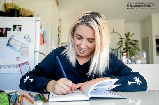  ??  ?? New Plymouth’s Bayli Johns illustrate­s the story books, a job which taps into her artistic abilities as well as her emotions. PHOTOS: ANDY JACKSON/STUFF