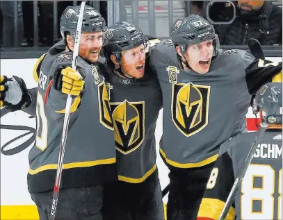  ?? Chase Stevens ?? Las Vegas Review-journal @csstevensp­hoto Knights center Cody Eakin, middle, with teammates Ryan Carpenter, left, and David Perron after scoring in the first period.