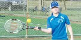  ??  ?? Right: Ruby Kuhnell hits a forehand return from inside the court during Baw Baw junior tennis.