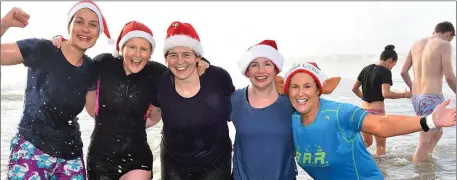  ??  ?? Ladies in the water at the Special Olympics Polar Plunge at Clogherhea­d beach