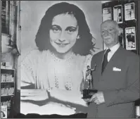  ??  ?? THWARTED: Dr. Otto Frank holds the Golden Pan award on June 14, 1971, given for the sale of one million copies of the famous paperback 'The Diary of Anne Frank' in London, Great Britain.