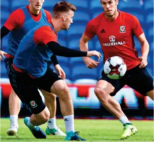  ??  ?? He’s back: Bale trains yesterday after missing June’s game