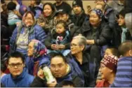  ?? MARK THIESSEN — THE ASSOCIATED PRESS ?? This photo shows community members awaiting the arrival of Santa Claus at Saint Michael, Alaska, a remote island community off Alaska’s western coast.