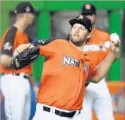  ?? Rob Carr Getty Images ?? CLAYTON KERSHAW started Sunday for Dodgers, making him ineligible to pitch in the All-Star game.