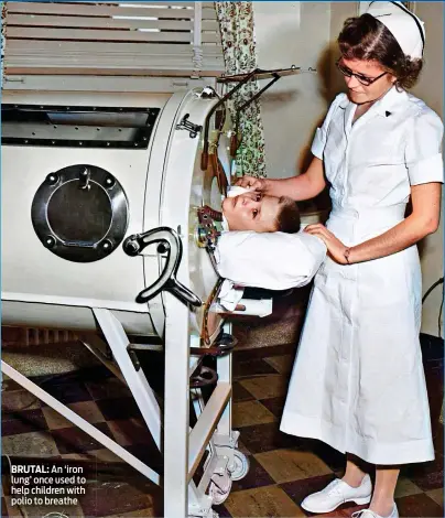  ?? ?? BRUTAL: An ‘iron lung’ once used to help children with polio to breathe