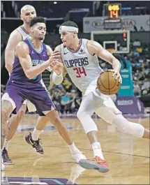  ?? Chuck Burton Associated Press ?? FORWARD TOBIAS HARRIS led the Clippers in scoring (20.9) and rebounding (7.9) before being sent to Philadelph­ia.