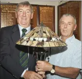  ??  ?? Prize winner Paul Davis with Baltinglas­s Golf Club captain John Kelly.