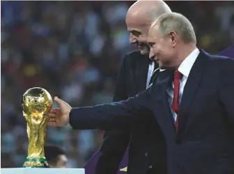  ??  ?? Problems...Gianni Infantino (left) and Vladimir Putin with the World Cup