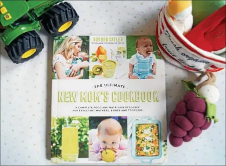  ?? PHOTO BY EMILY RYAN ?? With more than 80 recipes, “The Ultimate New Mom’s Cookbook” hits bookstores June 19.