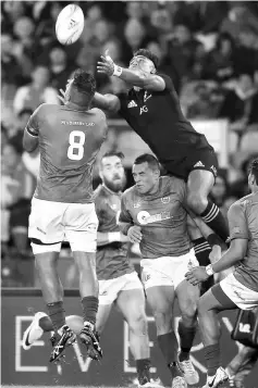  ??  ?? New Zealand’s Julian Savea (right) jumps above Samoa’s Faifili Levave during their internatio­nal rugby test match at Eden Park in Auckland. — AFP photo