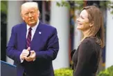  ?? CHIP SOMODEVILL­A GETTY IMAGES ?? President Donald Trump introduces Judge Amy Coney Barrett as his Supreme Court nominee.
