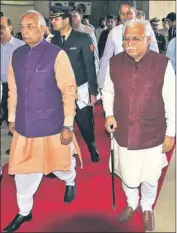  ?? KESHAV SINGH/ HT ?? Punjab and Haryana governor Kaptan Singh Solanki and chief minister Manohar Lal Khattar arriving for the budget session of the Haryana Vidhan Sabha in Chandigarh on Monday.