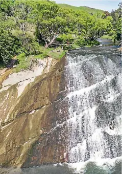  ??  ?? The Rere Rockslide is a popular spot. However, weekly monitoring has it ‘‘unsafe’’ for swimming due to E.coli levels. Inset: Lake Rotoehu.