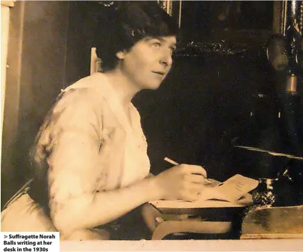  ?? ?? Suffragett­e Norah Balls writing at her desk in the 1930s