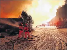  ??  ?? Approximat­ely 40 firefighte­rs teamed up to battle the blaze.