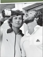  ??  ?? NATIONAL HEROES: Bob helps Ian Botham celebrate at Headingley in 1981. Top: In action during the Test match