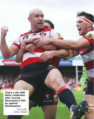  ?? PICTURE: Getty Images ?? That’s a lift: Willi Heinz celebrates after scoring Gloucester’s fifth try against Northampto­n