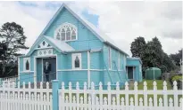  ?? ?? Norsewood’s former St David’s Presbyteri­an Church with its new NZ Heritage powder blue paint job.