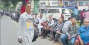  ?? AFP ?? DMK supporters gather in front of the hospital where their party president M Karunanidh­i is admitted in Chennai on Saturday.