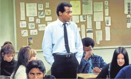  ?? WALT DISNEY TELEVISION ?? Lloyd Haynes (center) portrayed history teacher Pete Dixon on ABC’s groundbrea­king half-hour comedy-drama “Room 222,” which premiered in 1969 and took on some tough issues.