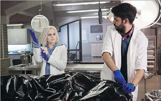  ??  ?? Rose McIver, left, plays a zombie med student who solves crimes in iZombie, airing March 17. Rahul Kohli co-stars.
— CW