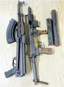  ?? CONTRIBUTE­D ?? Guns recovered by the St James police during an operation at Flanker, St James, on Tuesday, March 5, 2024.