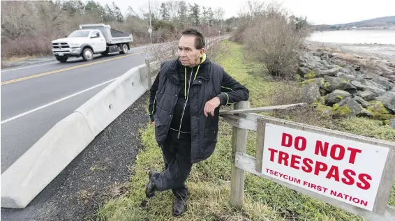  ?? DARREN STONE, TIMES COLONIST ?? Vern Jacks at ancient burial grounds on West Saanich Road. The Tseycum First Nation elder wants the province to move the road and permanentl­y protect the gravesite.