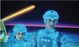  ?? ?? Got to admit it’s getting meta … Cindy Morgan and Bruce Boxleitner in Tron. Photograph: Disney/Kobal/Shuttersto­ck