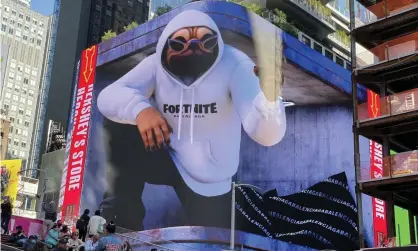  ?? ?? Everyone’s getting in on the act … Balenciaga's Fortnite billboard in New York. Photograph: MediaPunch/REX/Shuttersto­ck