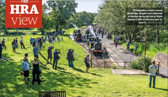  ?? JOHN FAULKNER ?? Photograph­ers swarm around Bembridge, Newport and Calbourne at Wootton during the Isle of Wight Railway’s 50th anniversar­y gala on June 12.