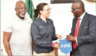  ??  ?? Governor Sanwo-Olu (right) with NFF President Pinnick (left)and leader of the FIFA team Rhiannon Martin (middle) in Lagos yesterday.