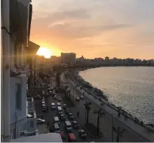  ??  ?? TOP: SUNSET over the Bay of Alexandria. Taken from our balcony at the Cecil Hotel.
ARABEYA HANTUR, one of the horse-drawn carriages of Alexandria.