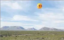  ?? Postcommod­ity ?? ARTIST COLLECTIVE Postcommod­ity will install two miles of “scare-eye” balloons at the U.S.-Mexico border in Arizona.
