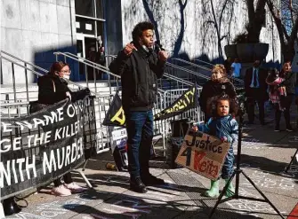  ?? Yalonda M. James/The Chronicle ?? Activists stage a protest outside the Hall of Justice on Wednesday in San Francisco. The D.A. has moved to drop the case involving an officer who killed Keita O’Neil as he fled in 2017.