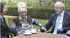  ??  ?? Tea and empathy... Dame Barbara and husband Scott have a cuppa with Prime Minister Boris Johnson last year