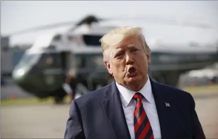  ?? PATRICK SEMANSKY—ASSOCIATED PRESS ?? President Donald Trump speaks with reporters before boarding Air Force One at Morristown Municipal Airport in Morristown, N.J., Sunday, Aug. 18, 2019.