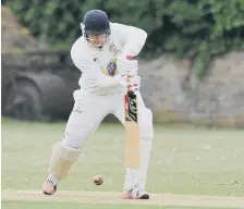  ??  ?? Kevin Dixon bats for Burnmoor against Washington in Division One.