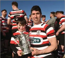  ??  ?? Enniscorth­y RFC team captain Ivan Poole with his son Sam.