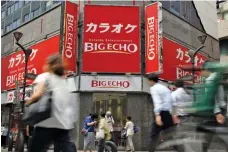  ?? (AFP) ?? This file photo shows a karaoke outlet, where teleworkin­g karaoke rooms can also be rented for business use, in Tokyo on August 30