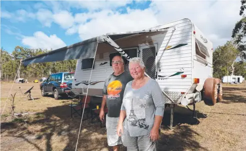  ?? Picture: STEWART McLEAN ?? HAPPY CAMPERS: Mick and Pam Elliott from Normanvill­e, South Australia, camping at Rocky Creek near Atherton.