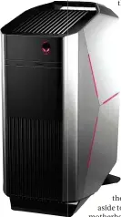  ??  ?? LEFT Alienware has neatly placed a DVD writer underneath its familiar logo