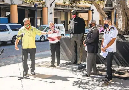  ?? JARROD VALLIERE U-T ?? Enrique Morones speaks to the media on Monday at the site of the bronze statue of former Gov. Pete Wilson near Horton Plaza Park.