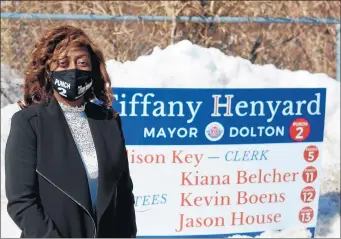  ?? JEFF VORVA/DAILY SOUTHTOWN ?? Dolton Village Trustee Tiffany Henyard, a candidate for mayor, stands outside Lincoln Elementary School on Tuesday.