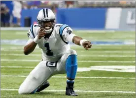  ?? PAUL SANCYA — THE ASSOCIATED PRESS FILE ?? Carolina Panthers quarterbac­k Cam Newton (1) celebrates a Kelvin Benjamin touchdown reception during an NFL football game against the Detroit Lions Sunday in Detroit.