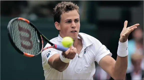  ?? — GETTY IMAGES ?? Canada’s Vasek Pospisil returns against Britain’s Andy Murray during their men’s quarter-final match at Wimbledon Wednesday. While Pospisil lost 6-4, 7-5, 6-4, he showed that he’s on the verge of taking his game to a new and higher level of play.