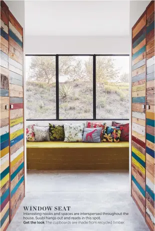  ??  ?? window seat
Interestin­g nooks and spaces are interspers­ed throughout the house. Suubi hangs out and reads in this spot.
Get the look The cupboards are made from recycled timber.